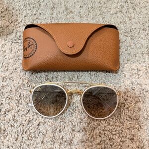 Ray-Ban Round Double Bridge in color Polished Gold/ Clear Grey